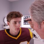 doctor-examining-football-player.jpg