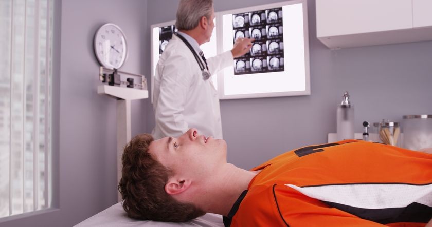 doctor-analyzing-hockey-players-brain.jpg