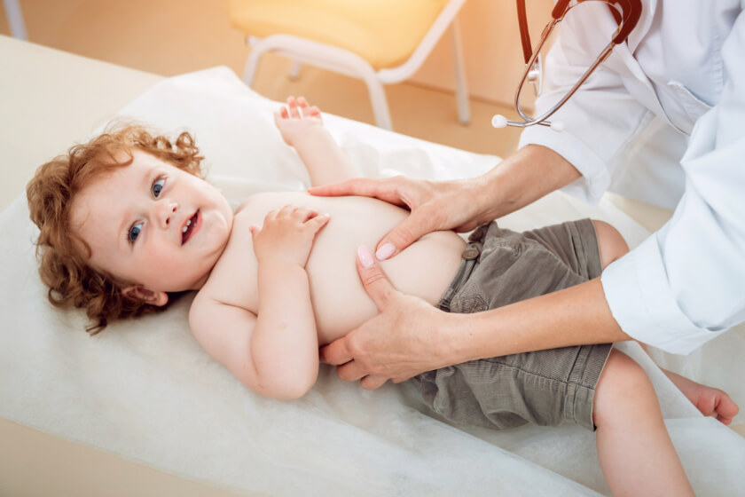 doctor-examining-child-stomach.jpg